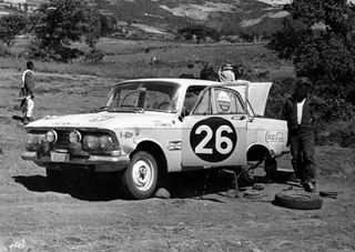 Illustration for article titled Moskvich-Driving Soviet Heroes Take On Capitalist Stooges In International Rally Competition